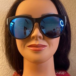 MCM black sunglasses blue polarized. Never worn. No scratches